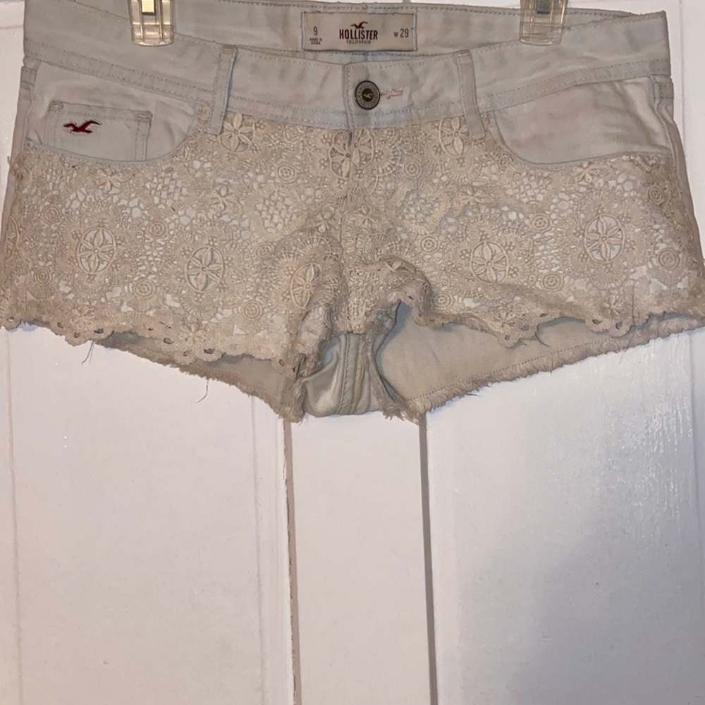 Size 9 Hollister Jean Shorts with White Lace Detailing on the front!